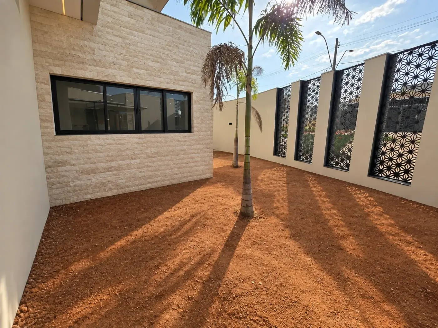 Before: a bare-earth garden, not yet planted